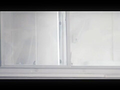 Manhattan Changing in Window