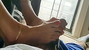 Milf Give a Footjob in a Hotel