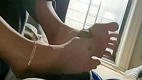 Milf Give a Footjob in a Hotel