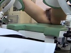 Nasty gyno played with the twat of a cute Japanese babe