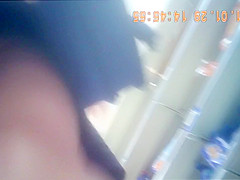 Nice upskirt shot of a woman clenching her cheeks on spy ca
