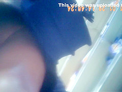 Nice upskirt shot of a woman clenching her cheeks on spy ca