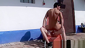 Philip Kraus rides Denis Raw's raw cock by an outdoor pool