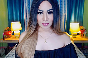 Pretty Face Tranny Jerking Her Cock