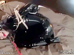 Pretty Lady In Catsuit Bound With Vibrators