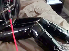 Pretty Lady In Catsuit Bound With Vibrators