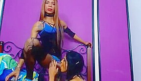 Pretty Tranny Slurps a Big Hard Cock