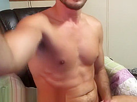 Sexy Tan Boy Toy Enjoys His Muscular Body Until He Cums On Himself