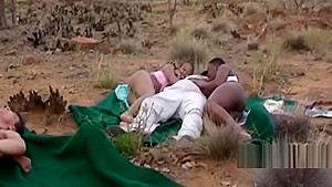 Sexy black babe blowing dick outdoors