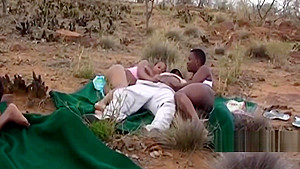 Sexy black babe blowing dick outdoors