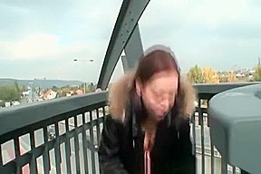 Sexy redhead chick sucks cock on the road