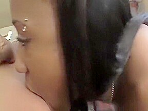 Sexy slender brunette engages in lesbian sex with a sultry black girl