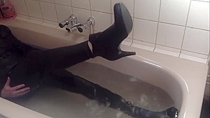 Sexy tight pants ankle boots and heels in bath