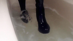 Sexy tight pants ankle boots and heels in bath