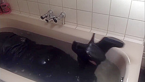 Sexy tight pants ankle boots and heels in bath