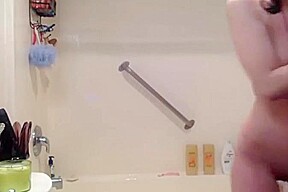 Shaved college girl goes wild in the shower