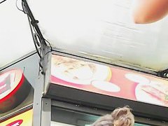 Short skirt of a hot blonde invites a street