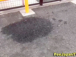 Spied on asian urinates