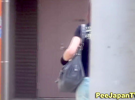 Spied on asian urinates