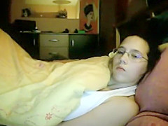 Spying as she rubs it under a blanket