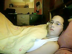 Spying as she rubs it under a blanket