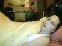 Spying as she rubs it under a blanket