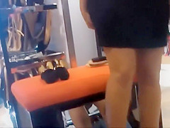 Spying between her petite thighs