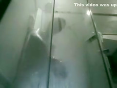 Spying on Her in the Shower and Filming Her Naked
