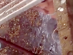 Spying on a topless girl showering outdoors