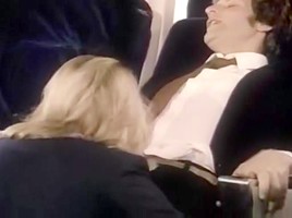 Stacey Donovan, Paul Thomas in retro porn clip featuring sex with a stewardess
