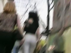 Street candid action with brunette office lady in strict and sexy pants