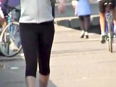 Street candid girl is going to ride her bicycle before cam 03t