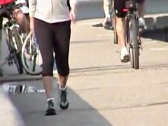 Street candid girl is going to ride her bicycle before cam 03t