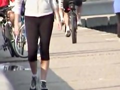 Street candid girl is going to ride her bicycle before cam 03t