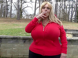Suzie Q Smoking and Flashing Big Boobs