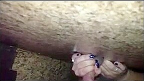 Swinger wife sucks and fucks in the gloryhole