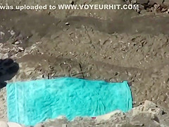 The couple was caught while masturbating on public beach