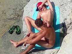 The couple was caught while masturbating on public beach