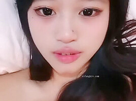 Thin Asian dude films himself fucking his stunning girlfriend while she's undressed 