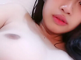 Thin Asian dude films himself fucking his stunning girlfriend while she's undressed 