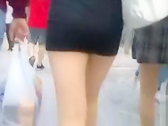 Tiny tight skirt on a German cutie walking in public