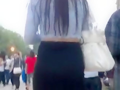 Tiny tight skirt on a German cutie walking in public