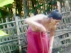Topless Indian wife washes herself
