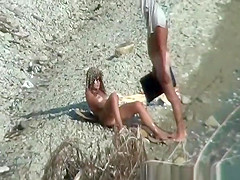 Two nudist couples spied at rocky beach