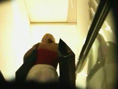 Up skirt videos present a hot blonde girl on the escalator