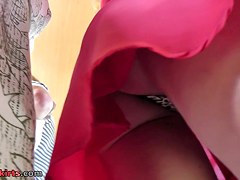 Upskirt voyeurist filmed pretty girl in short red dress