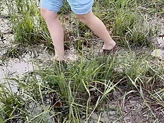 Walking Barefoot In A Swampy Bog - Muddy Feet