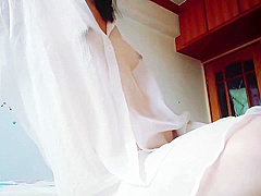 Woman In White Dress Masturbates In Bedroom