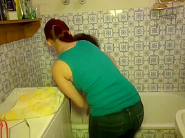 Young Girl and old Granny have fun in bathroom