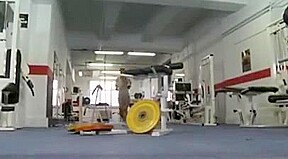 busty brunette having a sex workout in the gym